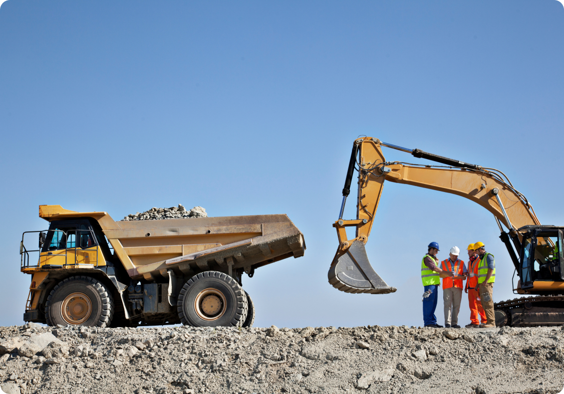 Excavator and a dump truck